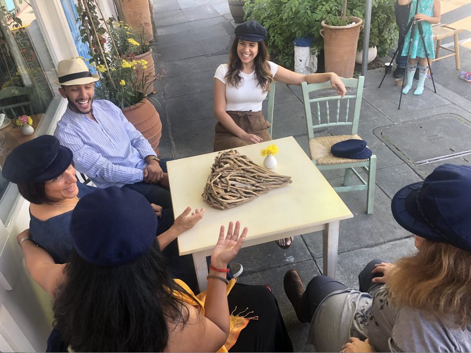 The Kafenia community hanging out during a photo shoot